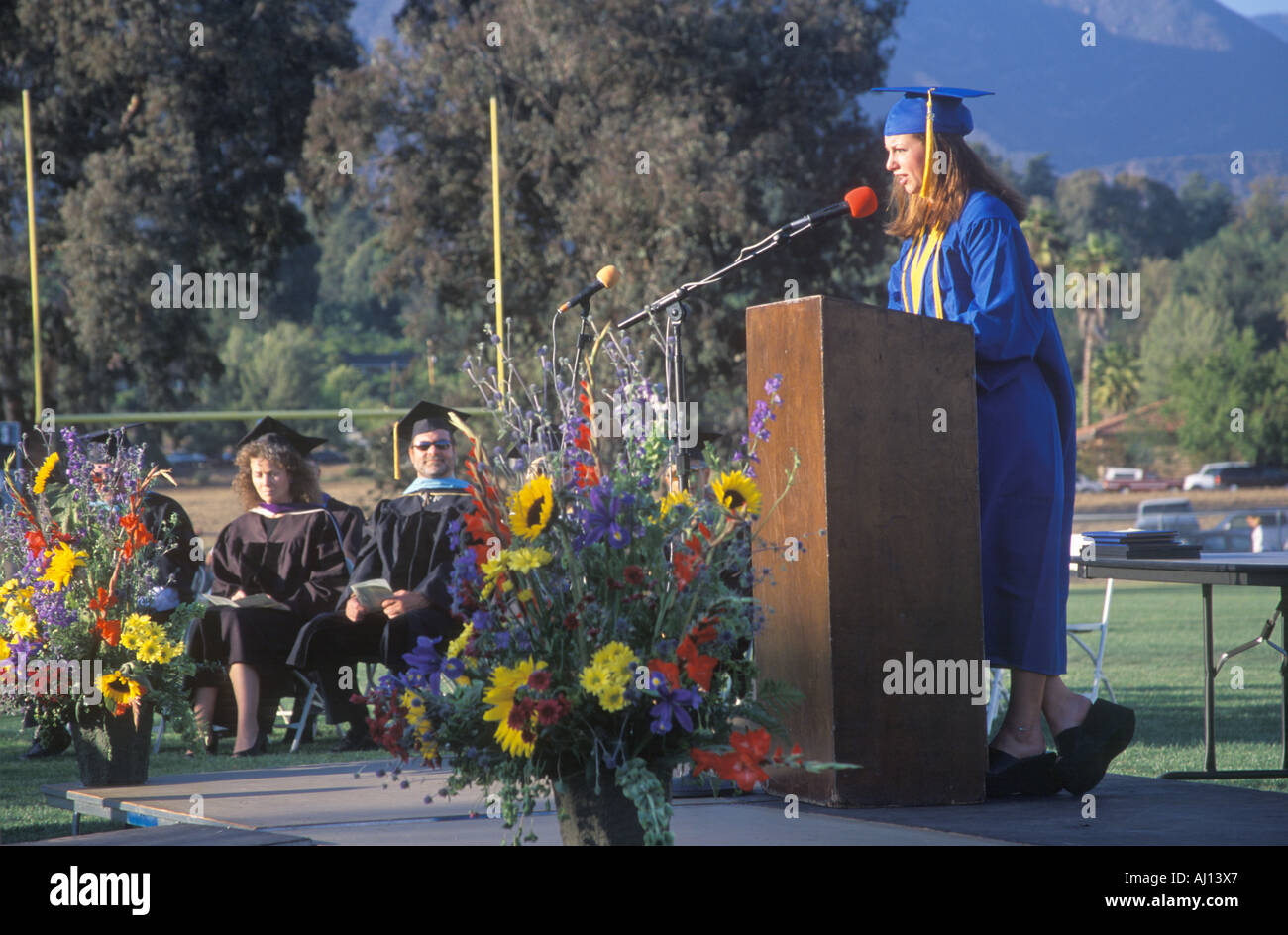 High school valedictorian giving her commencement speech Ojai CA Stock