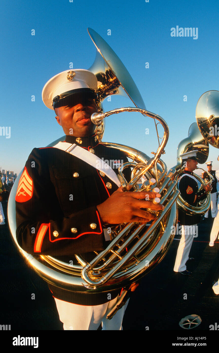 Tuba player for the United States Marine Corp marching band aboard the USS Kennedy Stock Photo