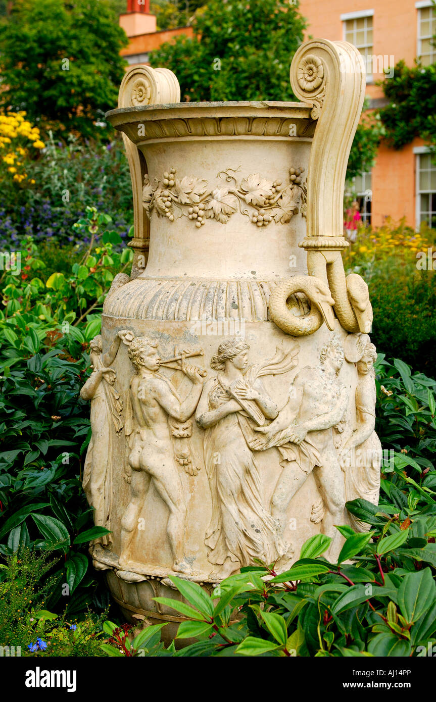 Large stone urn planter in a formal garden herbaceous border at a country house Stock Photo