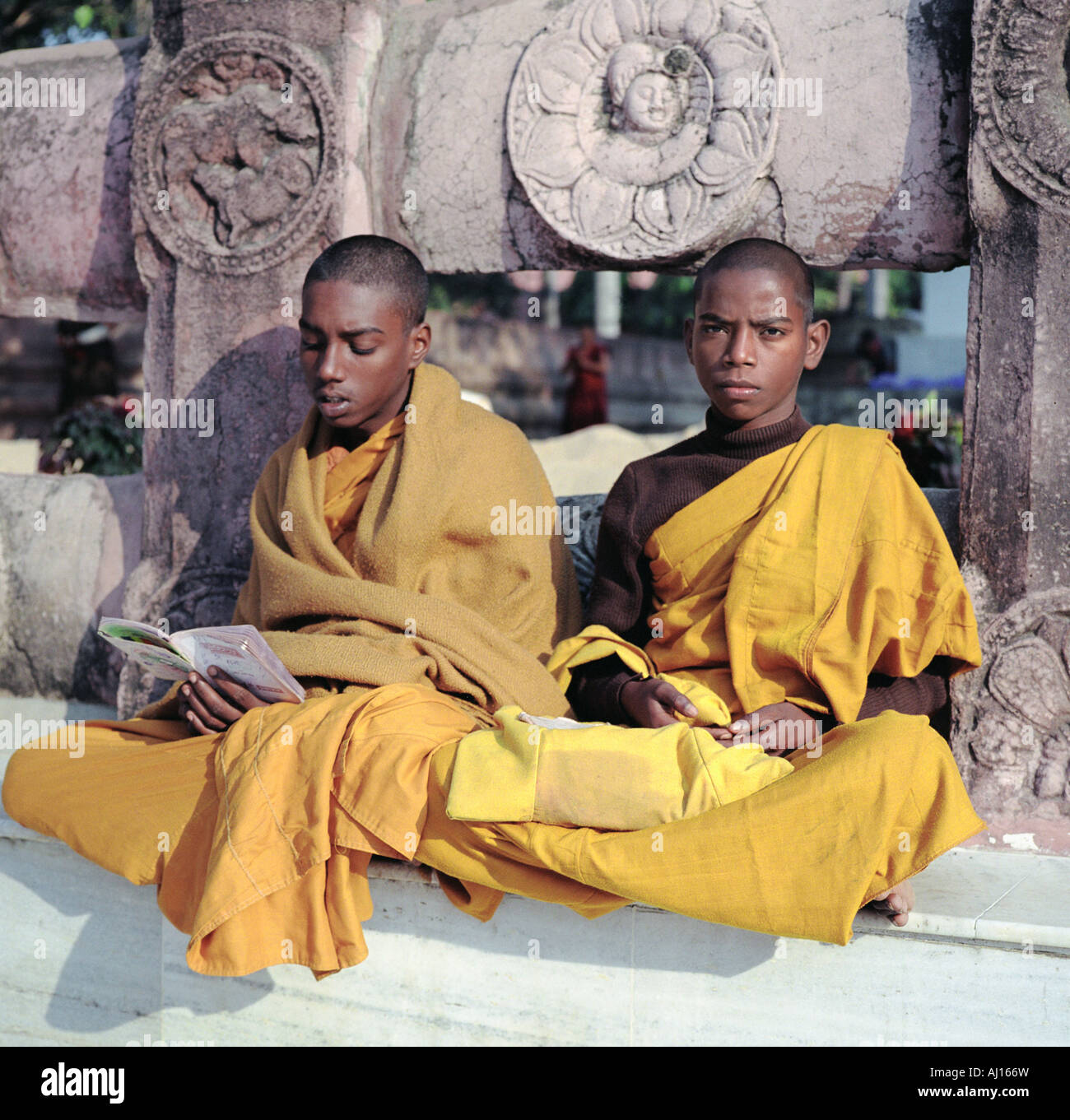 Young Buddhist Monks at the Mahabodhi Temple in Bodhgaya, India Stock Photo