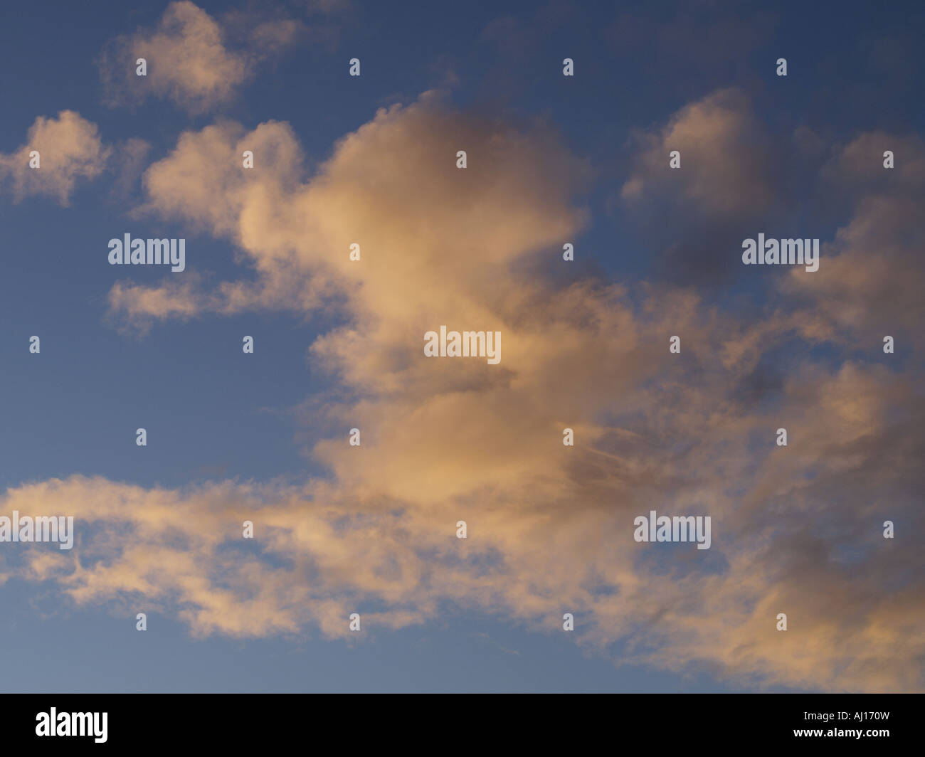 white and grey fluffy clouds, in a blue sky Stock Photo - Alamy