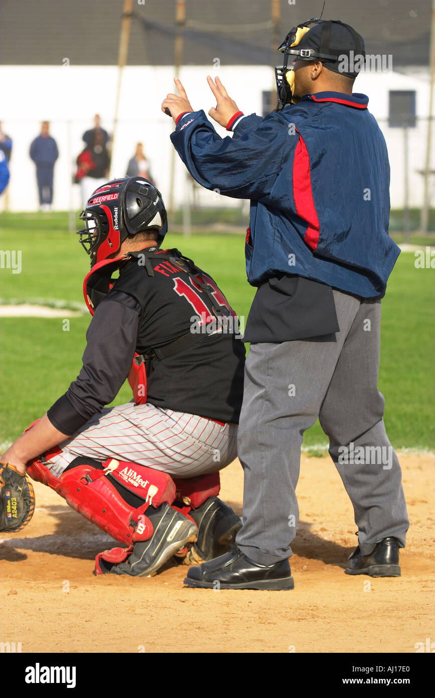 BASEBALL Highland Park Illinois Umpire signal balls and strikes to
