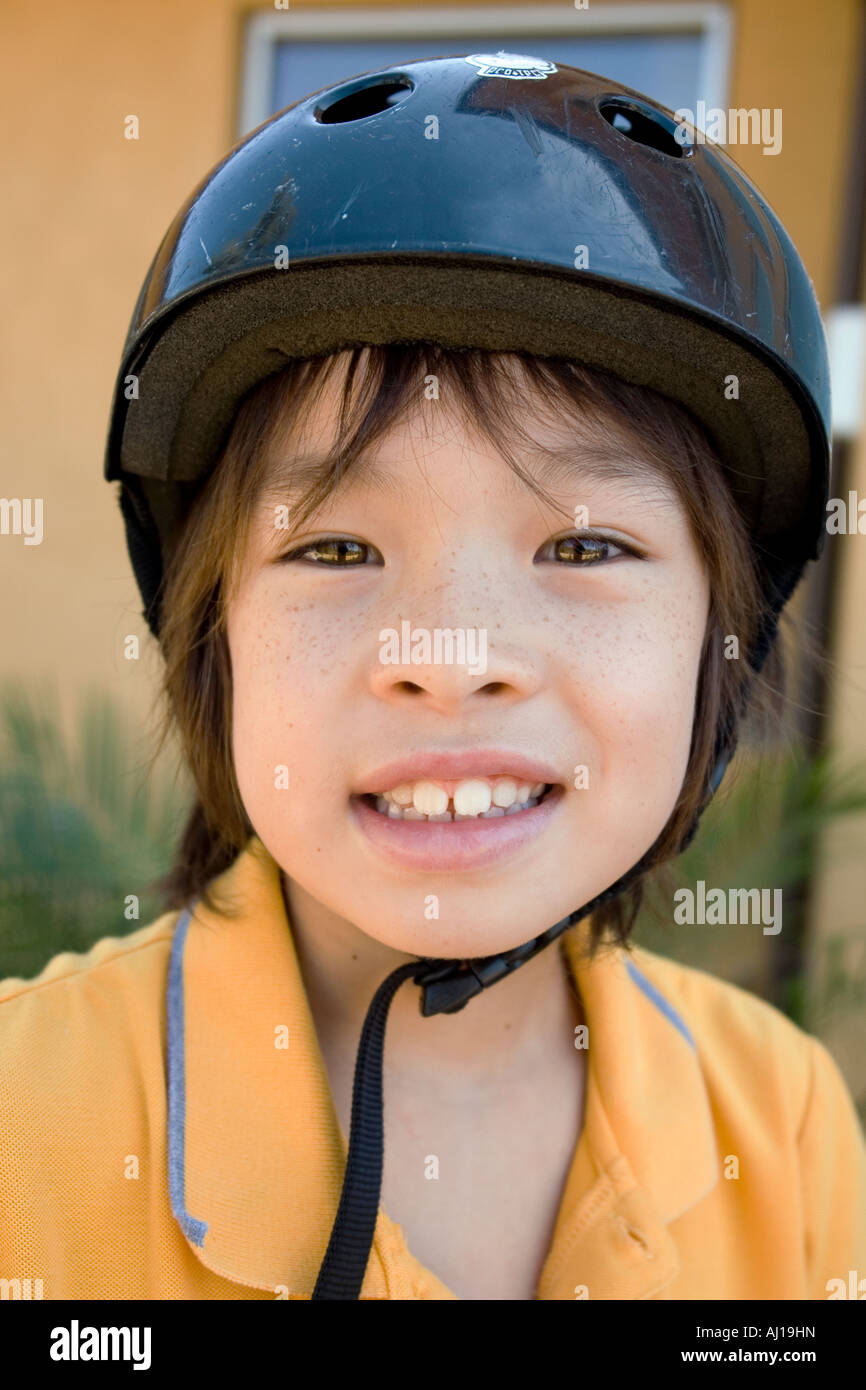 Young boy with helmet Stock Photo Alamy