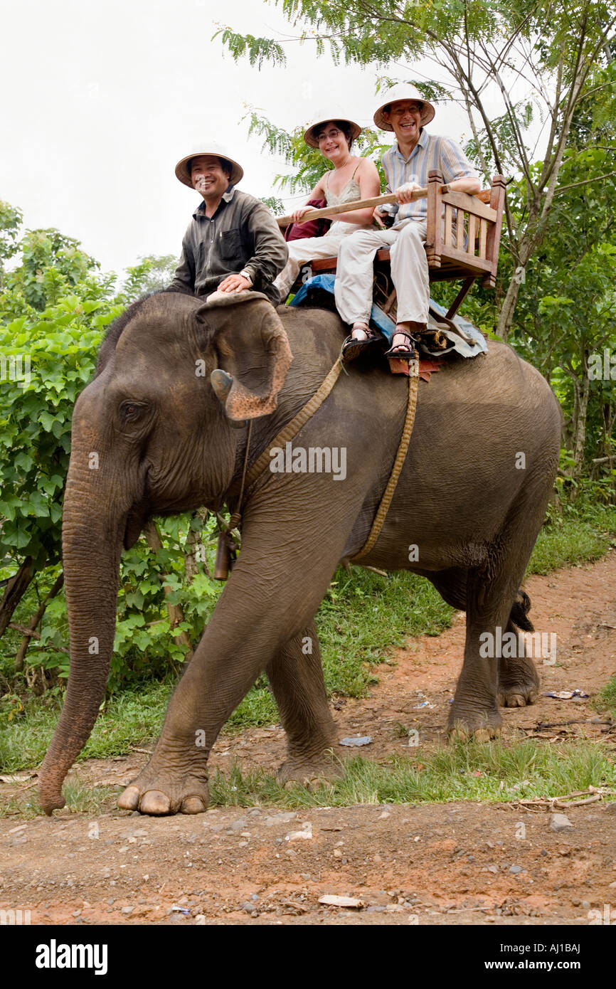 Guests riding an elephant at The Elephant Park Project near Luang