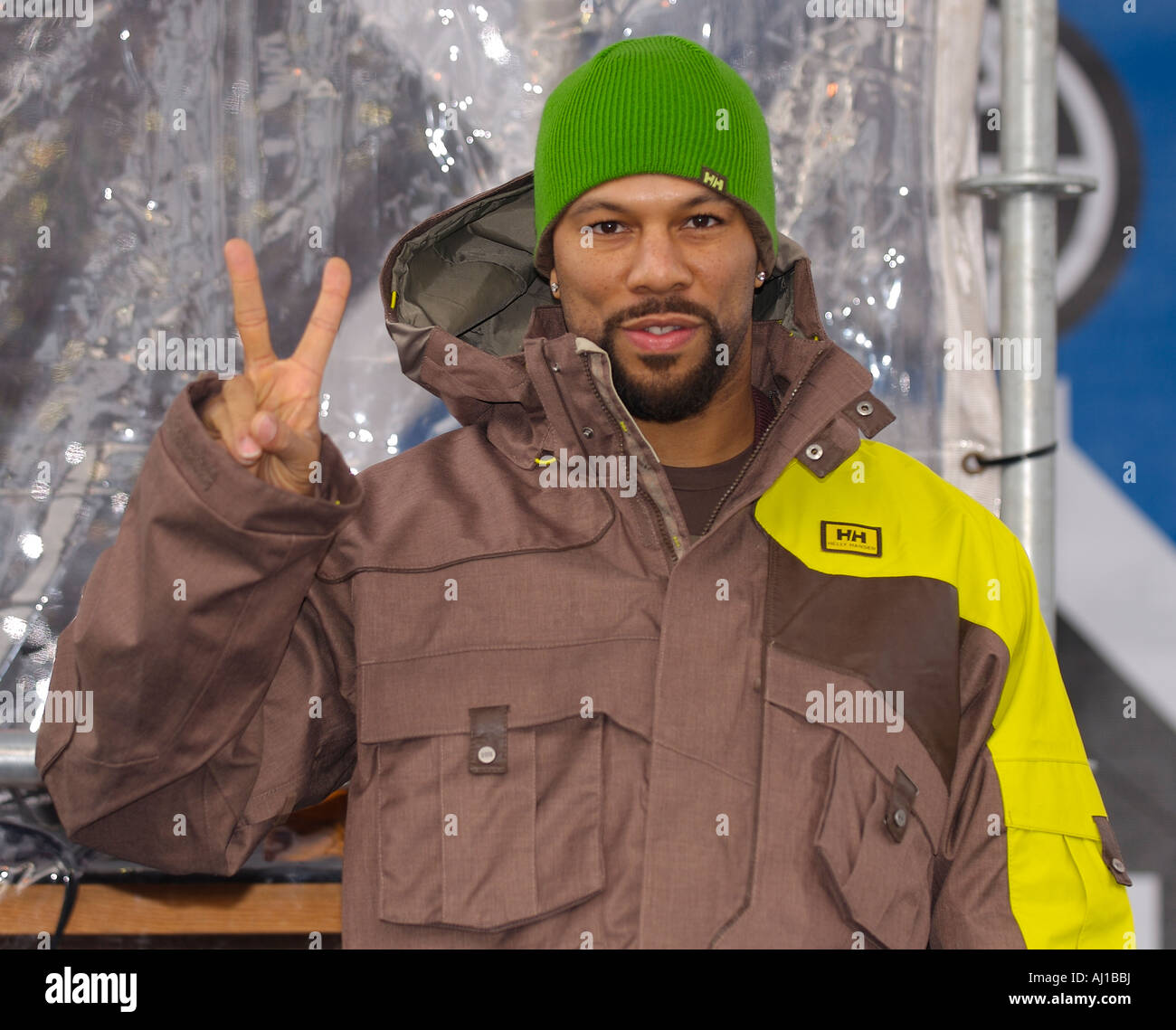 Grammy Award Winning Rapper Common give a peace sign at the 2007 ESPN Winter X Games 11 Snowboard Slopestyle Medal Ceremony Stock Photo