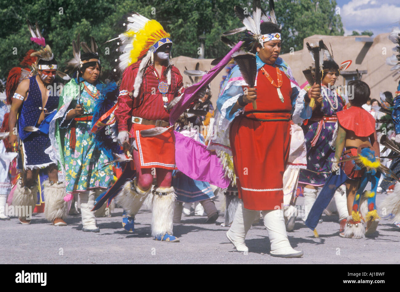 Procession of Native Americans in full costume during Corn Dance