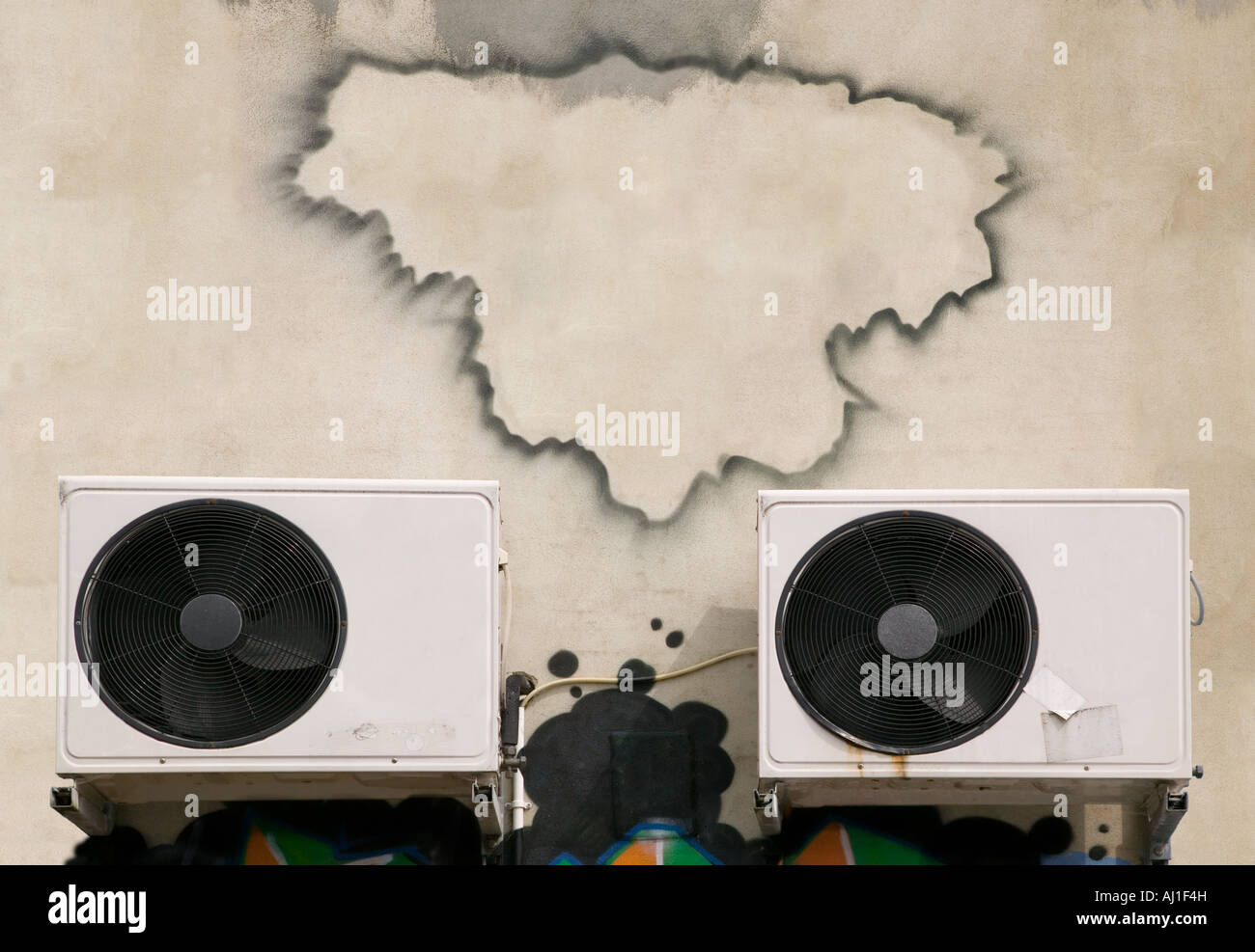Blank graffiti frame on a wall with aircon units add your own text Stock Photo