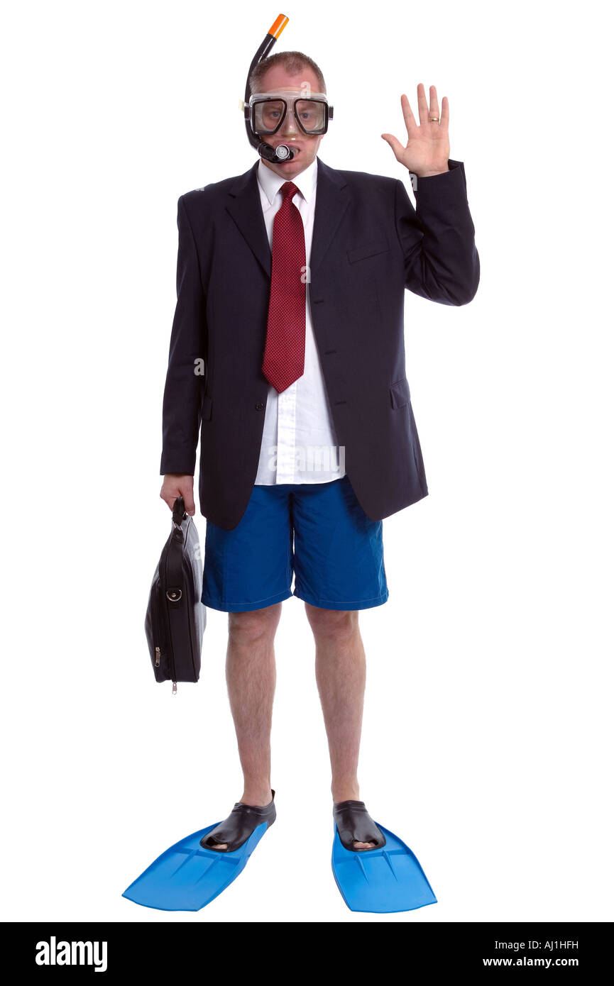 Business travel concept image a businessman in suit and scuba gear Stock Photo
