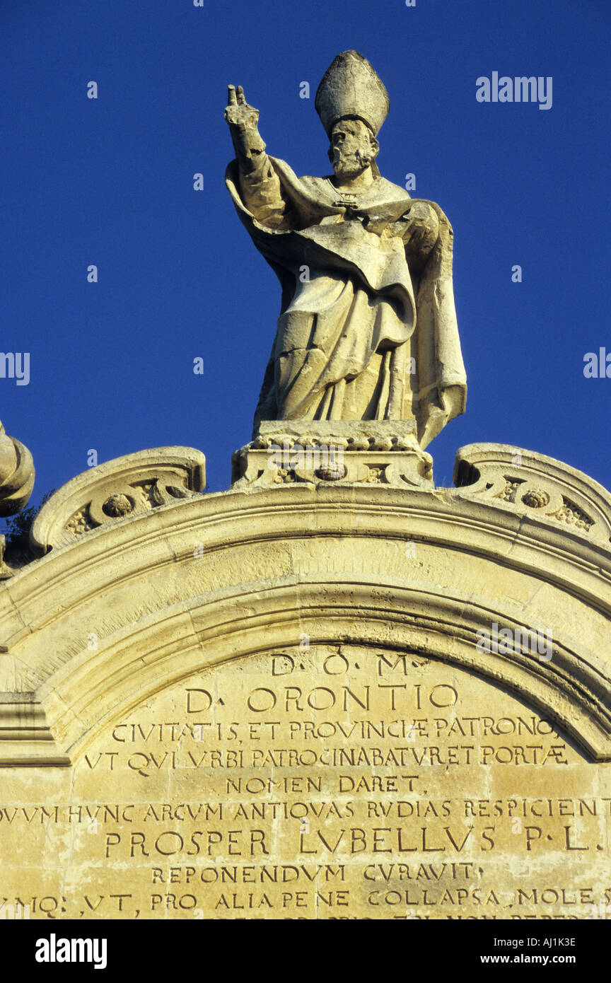 Porta Rudiae at the end of Libertini street topped with a statue of San Oronzo Lecce Puglia Italy Stock Photo