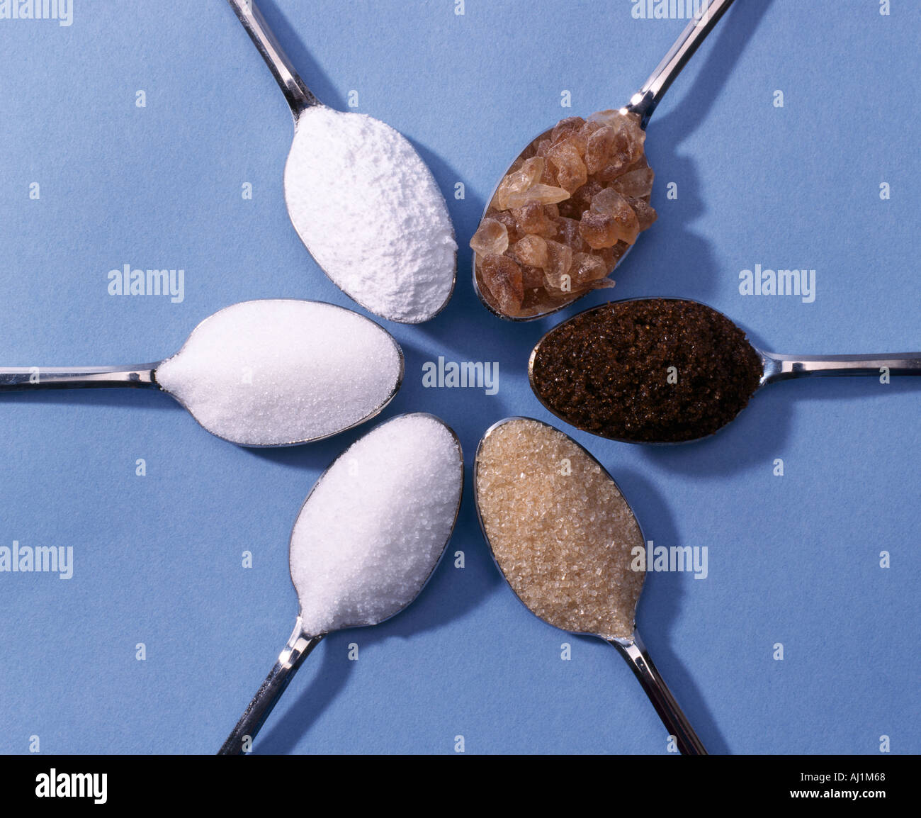 Six teaspoons of sugar icing caster granulated raw cane muscavado amber