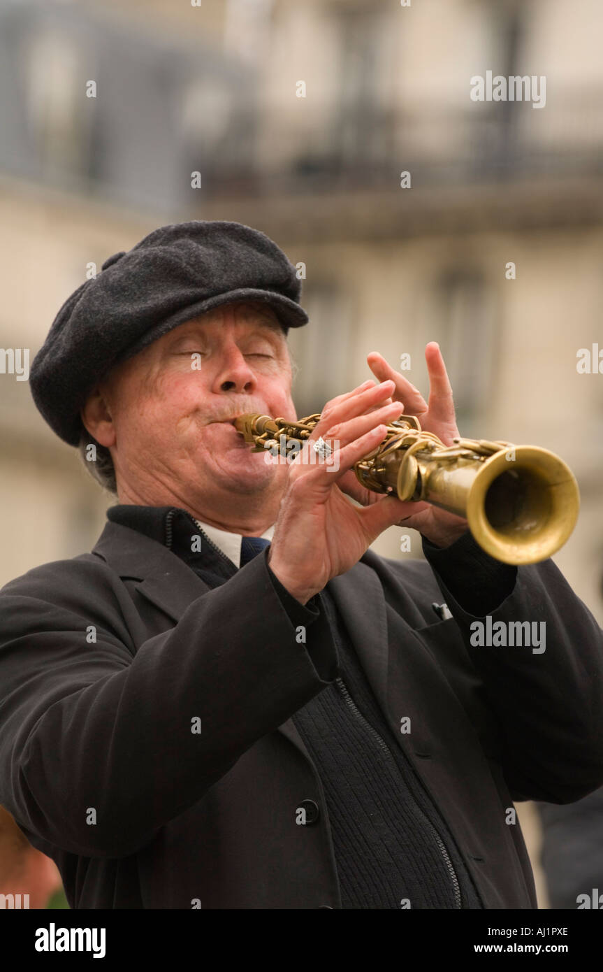 France, Paris, Street band soprano sax player Stock Photo