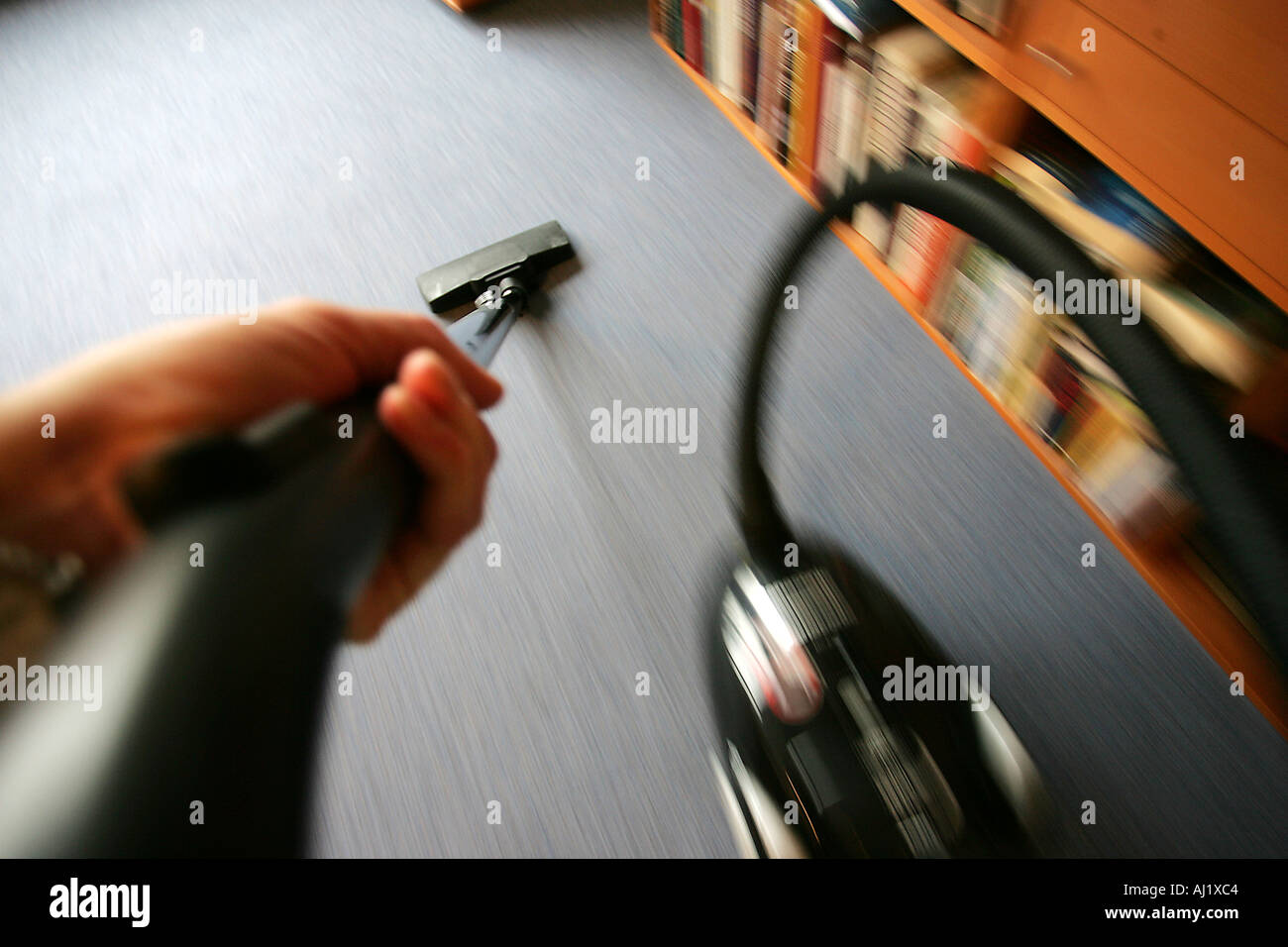 Housecleaning in a private house apartment vacuum cleaning Stock Photo