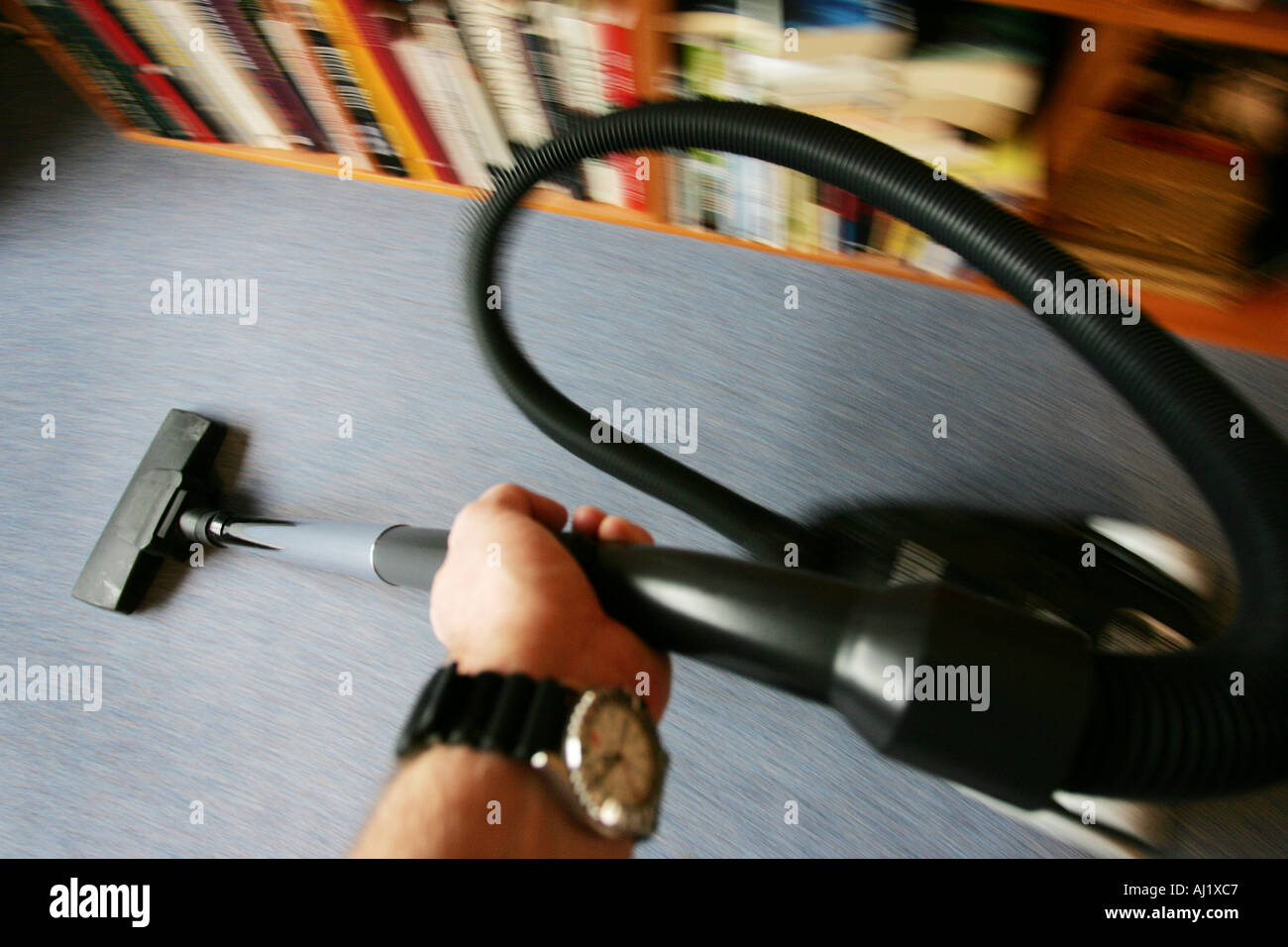 Housecleaning in a private house apartment vacuum cleaning Stock Photo
