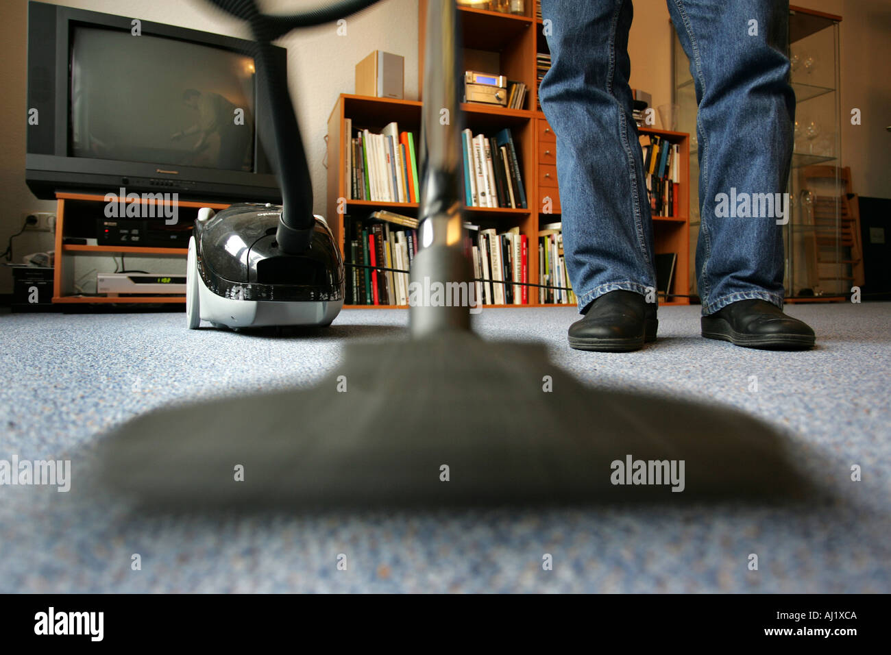 Housecleaning in a private house apartment vacuum cleaning Stock Photo