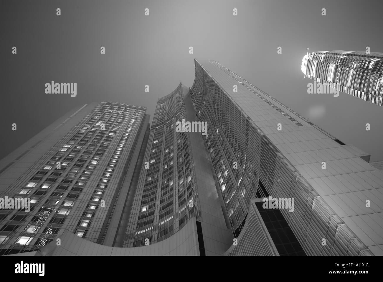 Asia Peoples Republic of China Hong Kong View looking up at modern architecture of Four Seasons Hotel Stock Photo