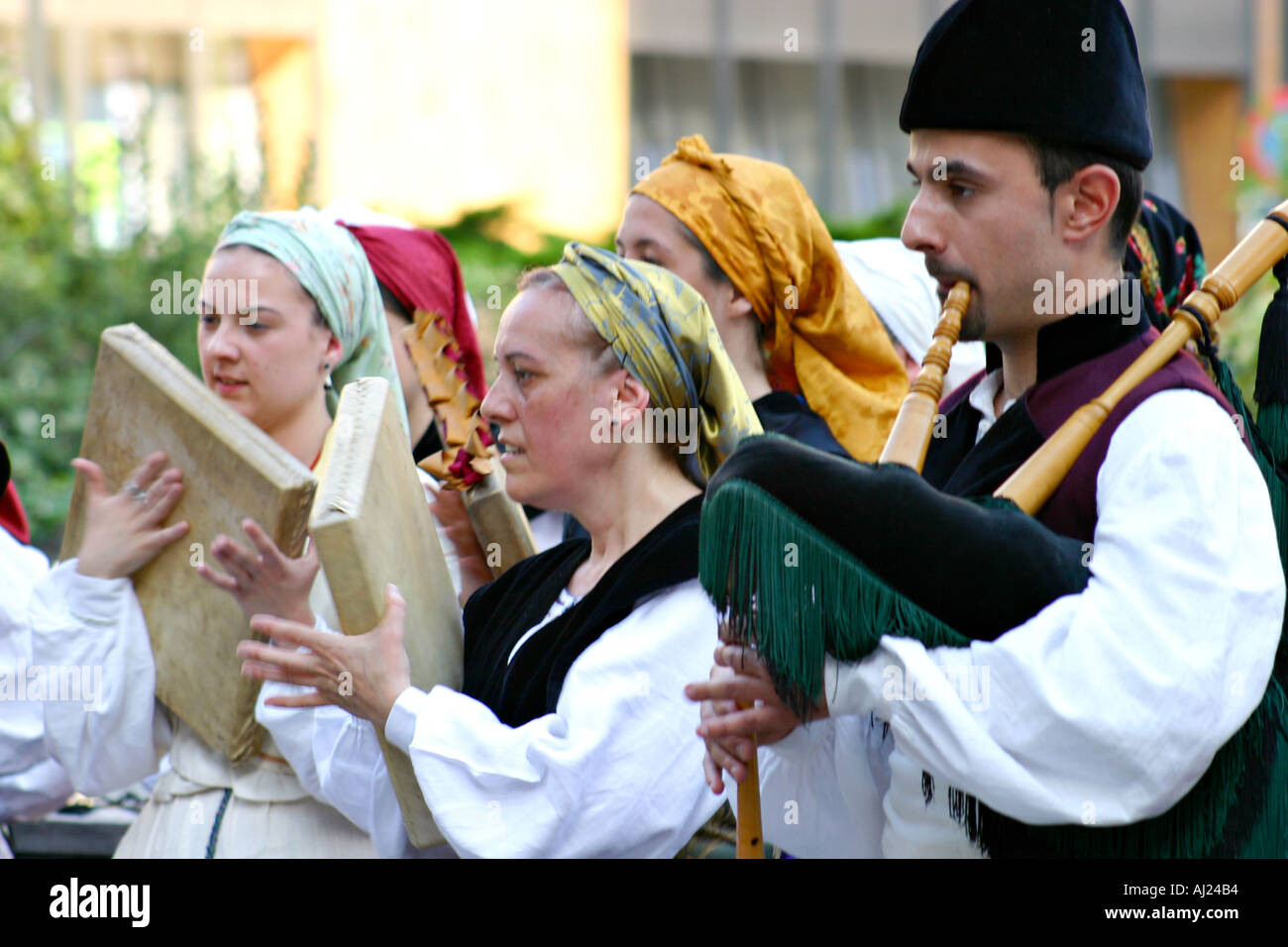 Asturian traditional musical group with tambourines and bagpipe Stock