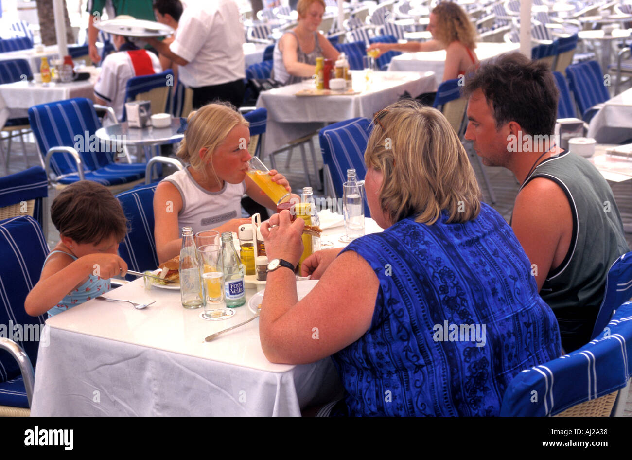 British family eating lunch outdoors at restaurant in San Antonio Stock Photo