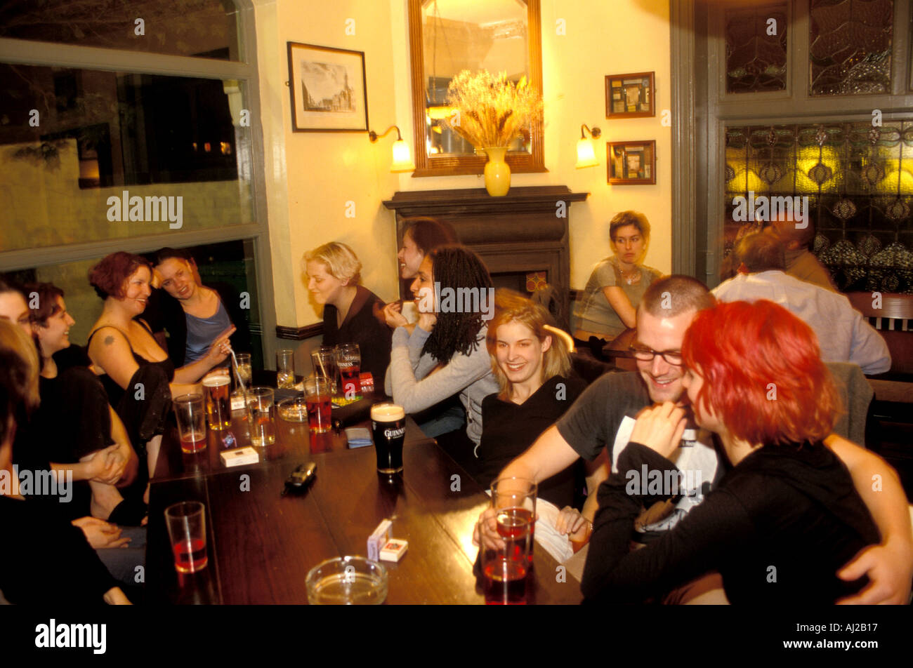Young people drinking in The Pembroke pub, Camden, London, England, UK Stock Photo