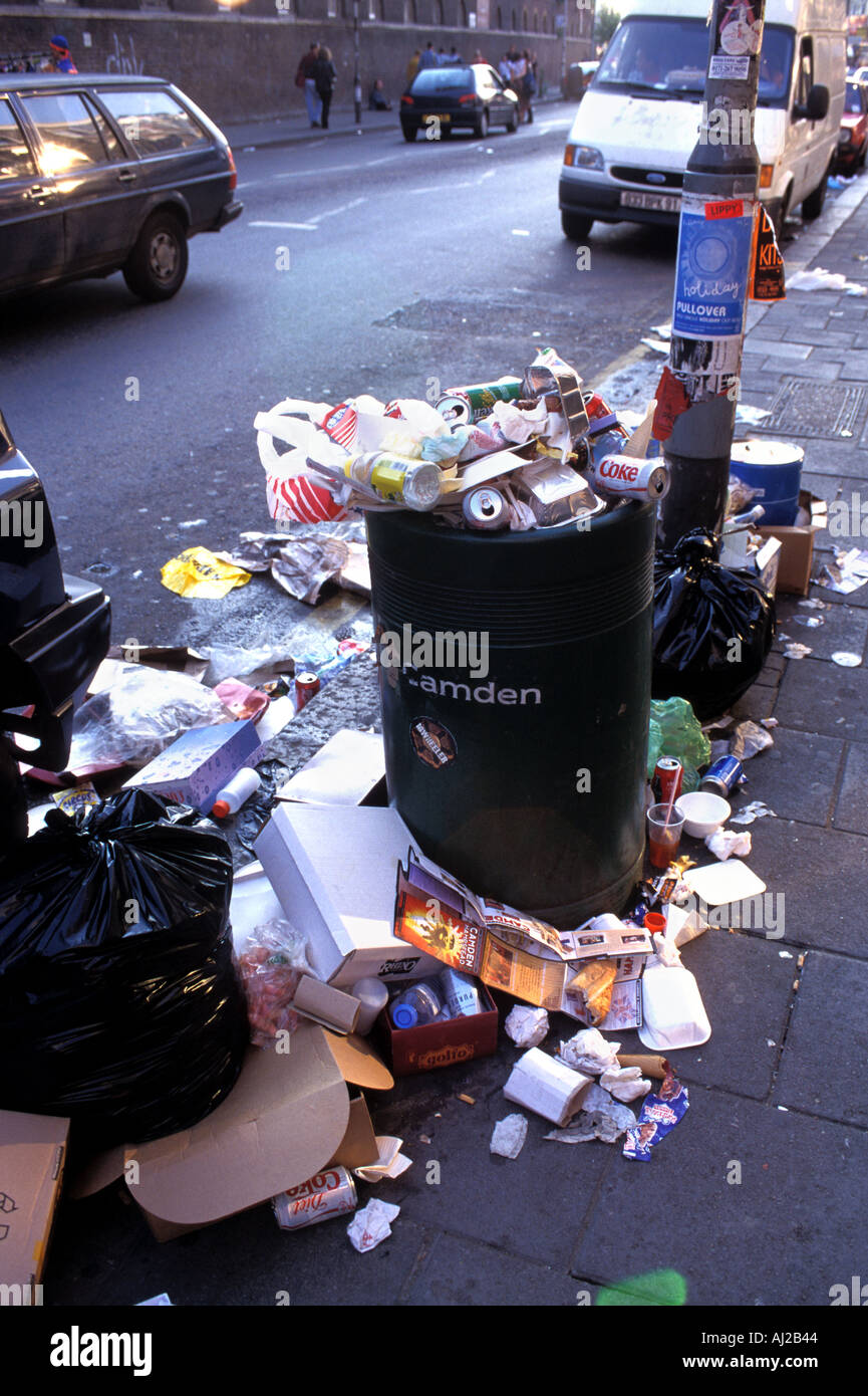 Overflowing rubbish bin, Camden, London, England UK Stock Photo