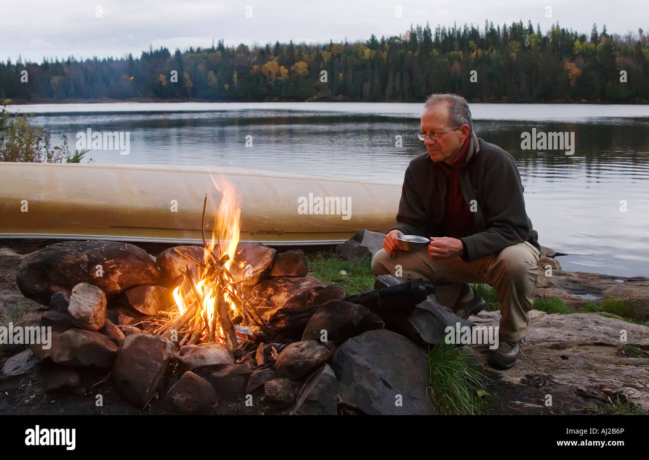 Campfire at canoe campsite in Algonquin Provincial Park Stock Photo
