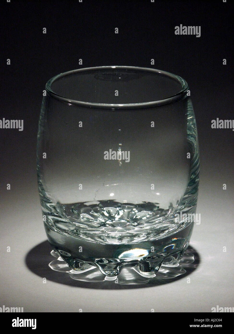 Little glass on studio light Stock Photo Alamy