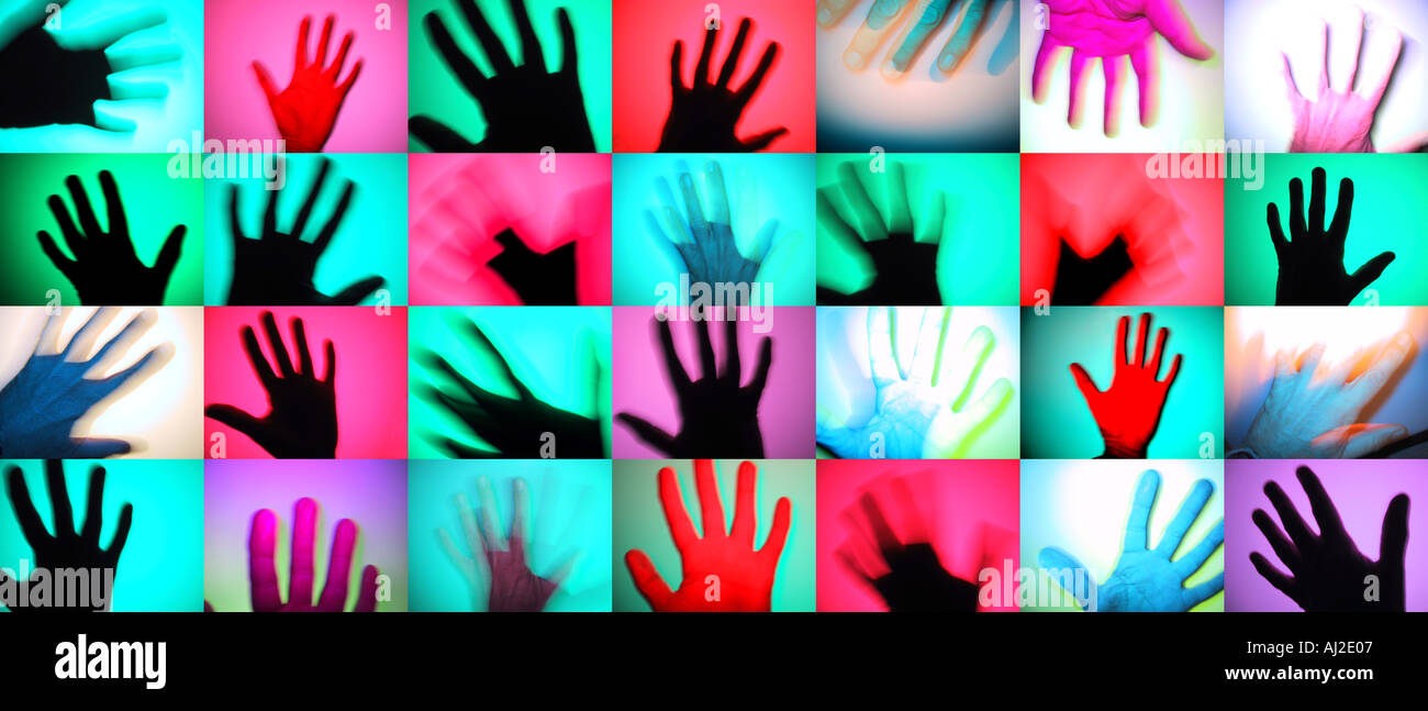 Rows of colourful hands. A modern photographic take on prehistoric rock art. Stock Photo