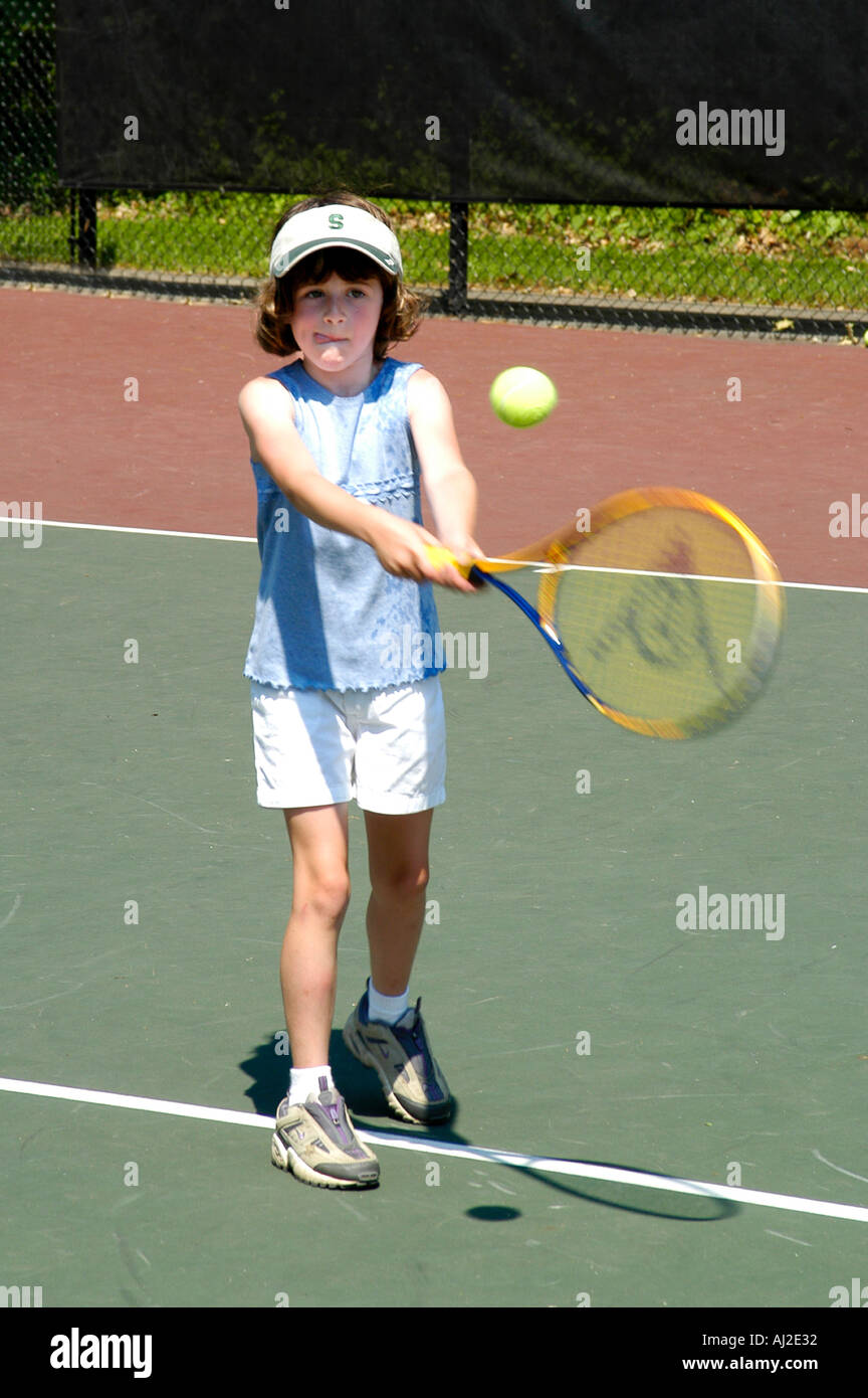 Kids Learn to Play Tennis at Public Recreation Court Stock Photo Alamy
