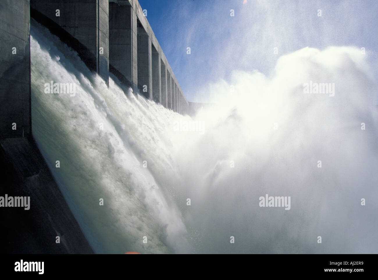 USA Washington Water pours through Chief Joseph Dam along Columbia River on spring morning Stock Photo