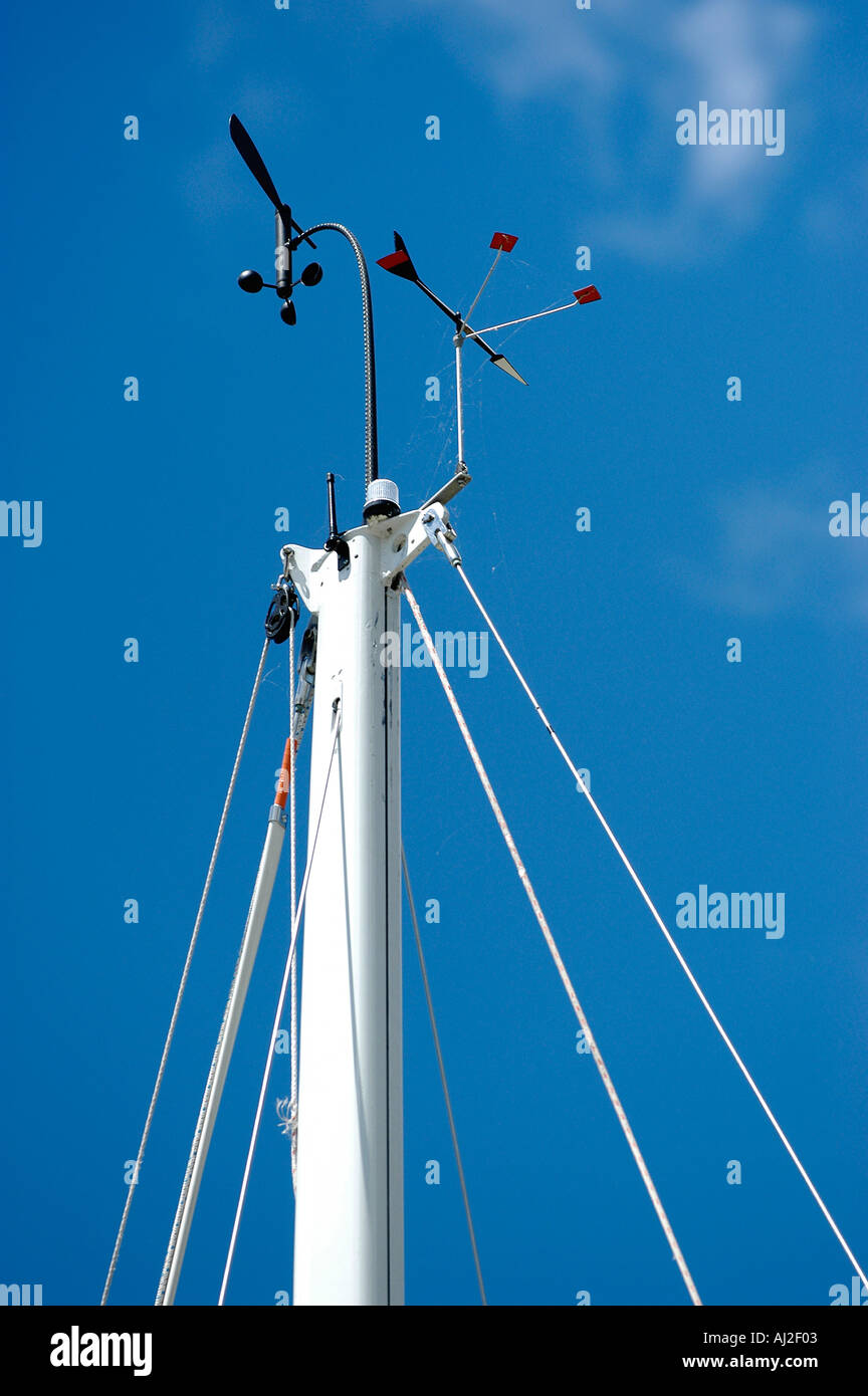 Weather Vane Indicating Wind Speed Atop of Sailboat Mast Stock Photo