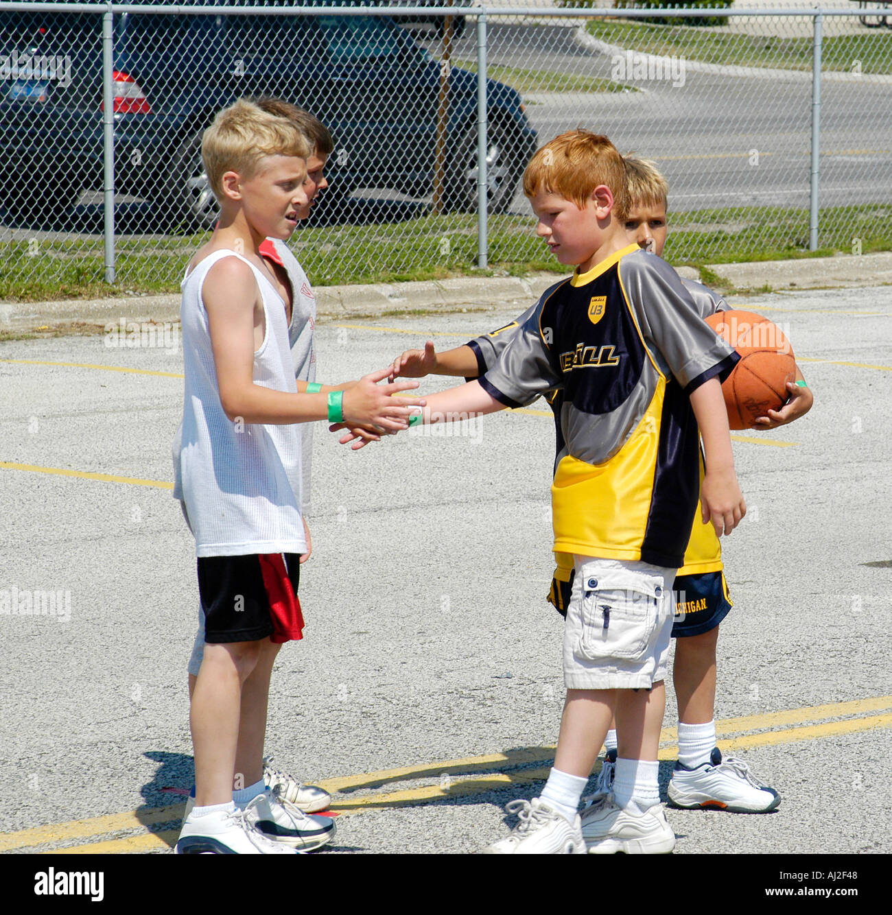 Kids Shake Hands after Basketball Game Stock Photo Alamy