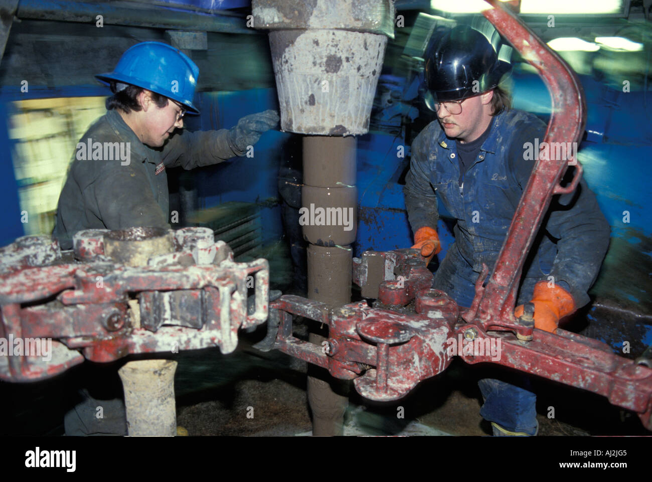 Canada British Columbia Oil crew works on drilling rig along Alaska Highway near Fort Saint John Stock Photo