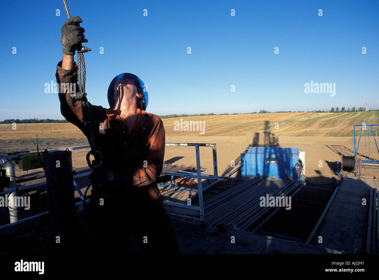 Canada Alberta MR Ron Bull works on Cactus Drilling Co oil rig on ...
