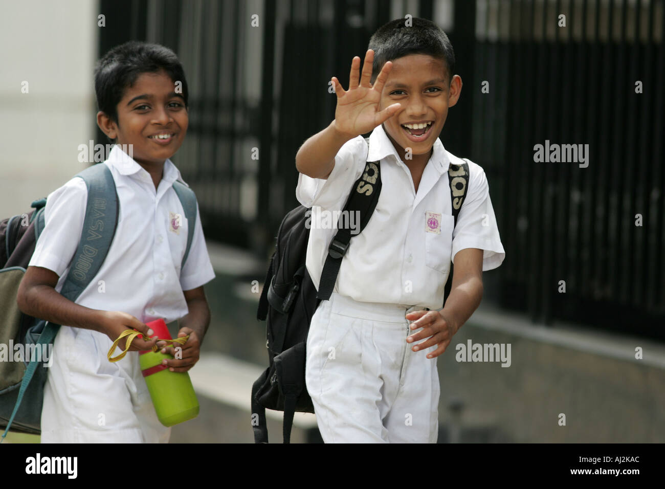 Schools out in Galle Sri Lanka students go home after end of lessons School  uniform Stock Photo - Alamy