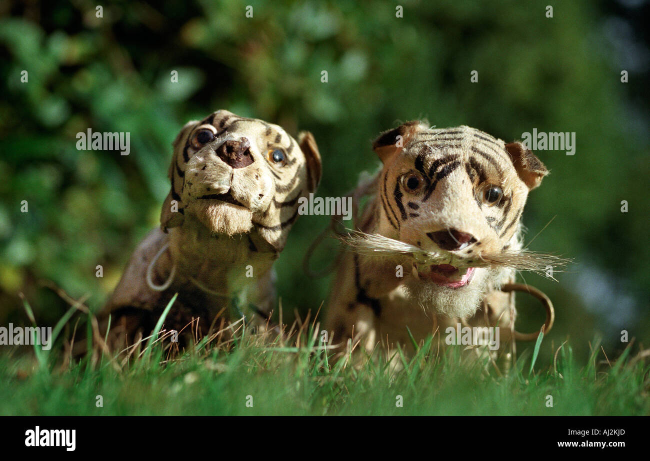 Victorian toy tigers with the keys to wind them up so they walk and growl Stock Photo Alamy