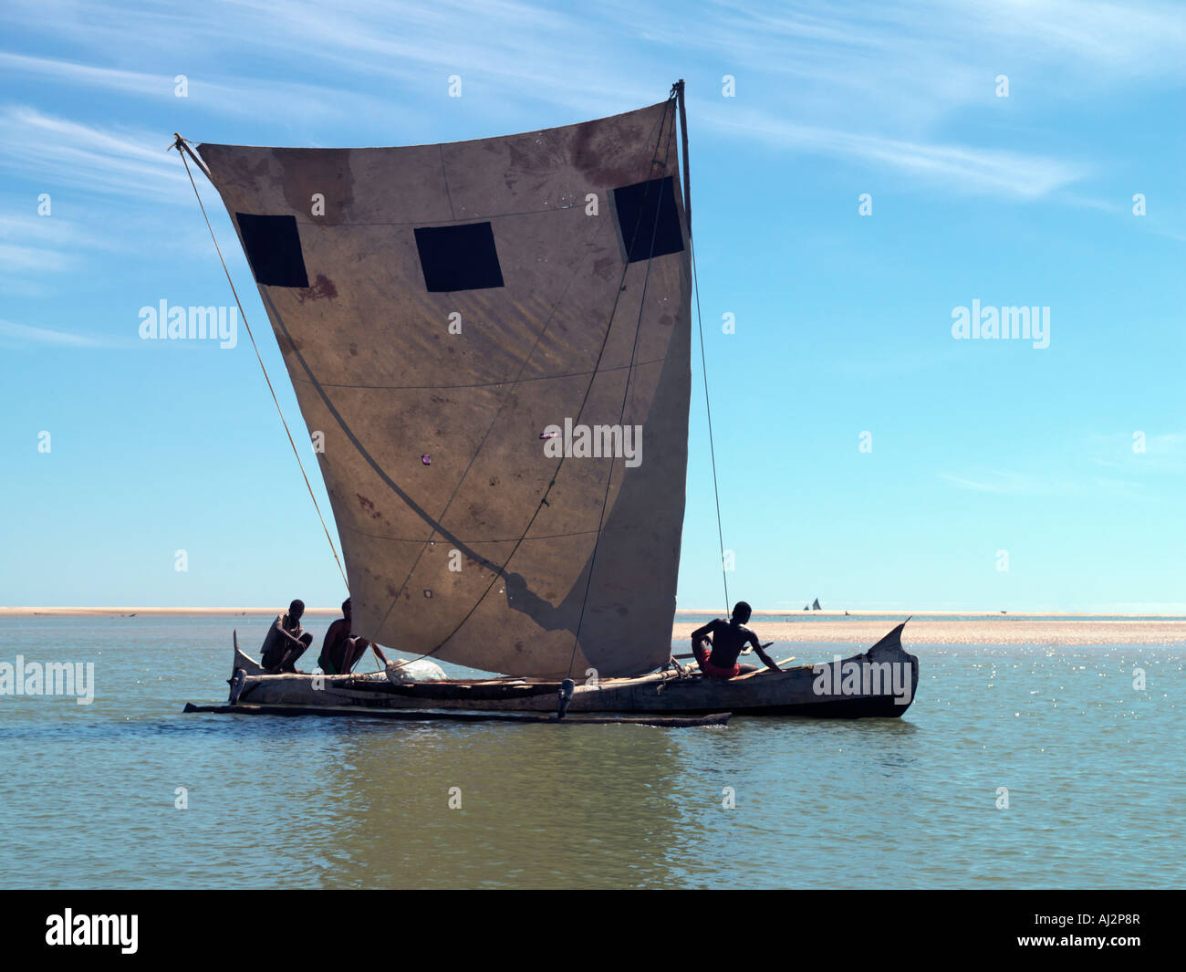 A Pirogue Or Local Fishing Boat At Morondava Madagascar Stock Photo a-pirogue-or-local-fishing-boat-at-morondava-madagascar-stock-photo