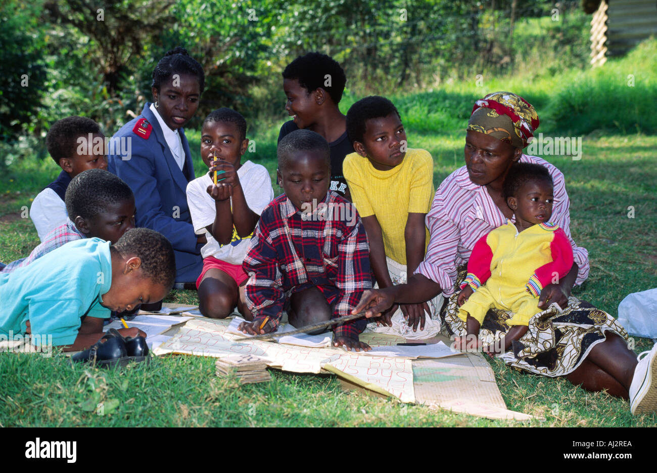 Orphans and street children learning to read and write at a school in Mbabane, Eswatini (Swaziland) Stock Photo