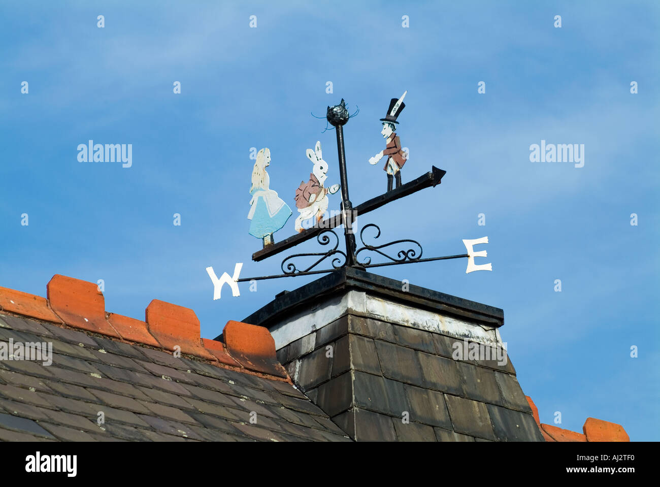 Alice in Wonderland windvane on top of the school in Daresbury Cheshire The village where Lewis Carroll lived Stock Photo