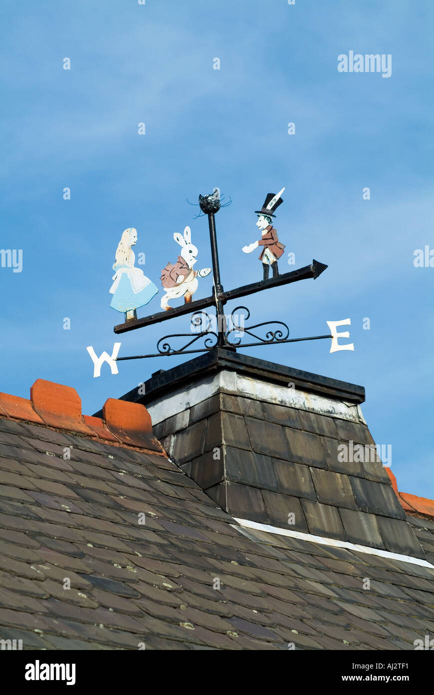 Alice in Wonderland windvane on top of the school in Daresbury Cheshire The village where Lewis Carroll lived Stock Photo