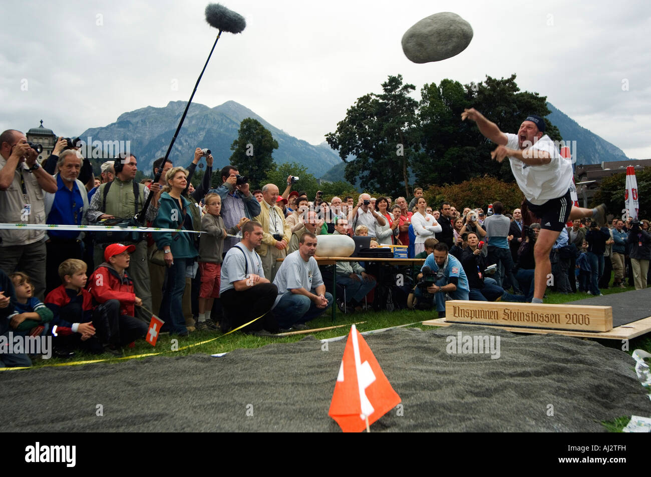 Stone throwing at the Unspunnen Bicentenary Festival, a traditional ...