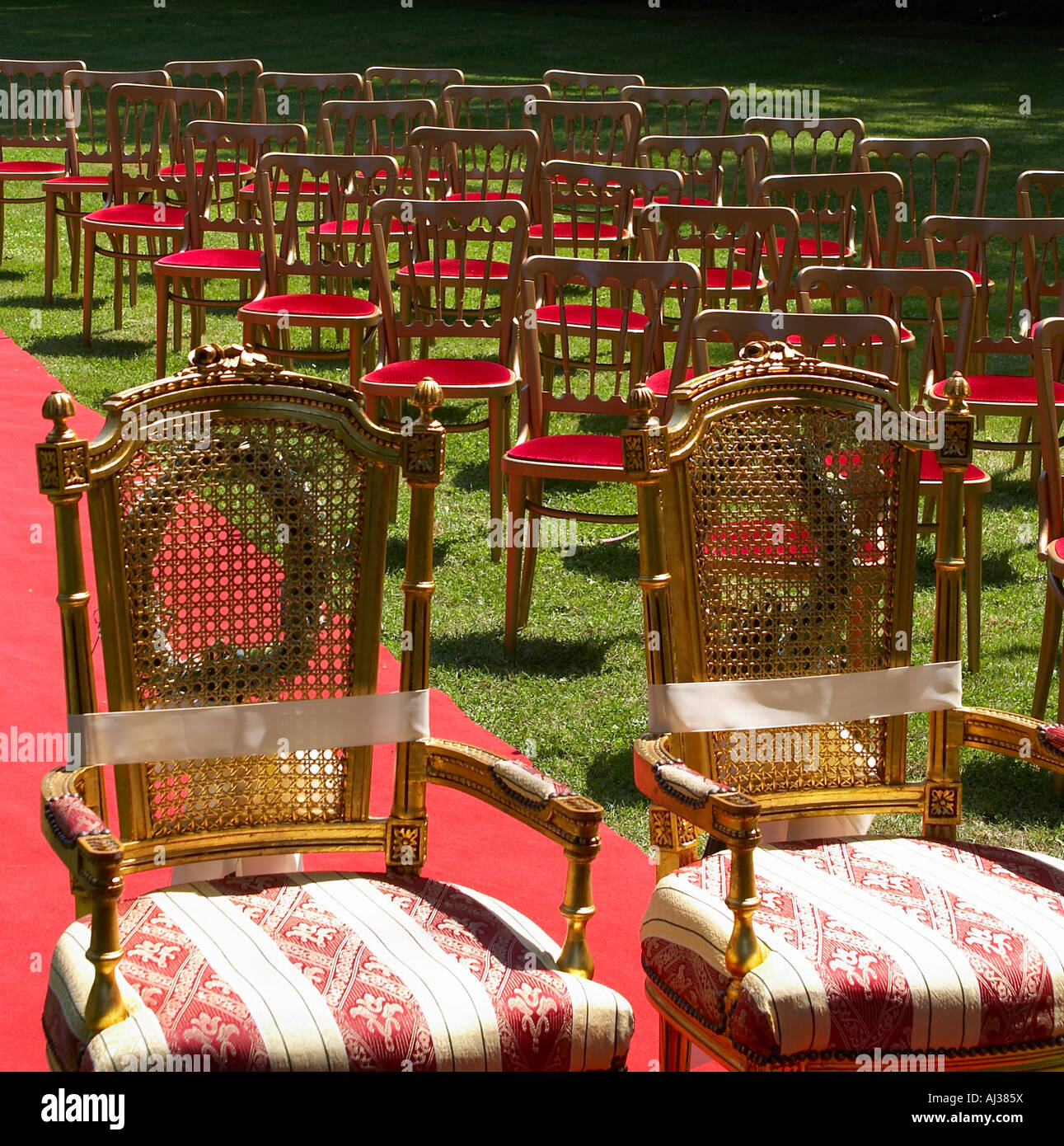 two chairs on red carpet Stock Photo Alamy