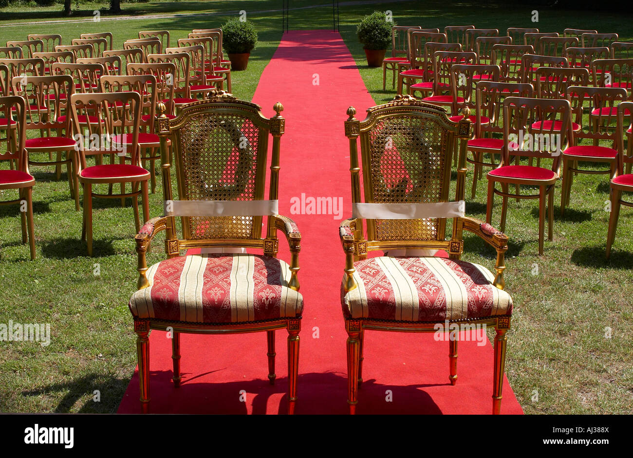 two chairs on red carpet Stock Photo