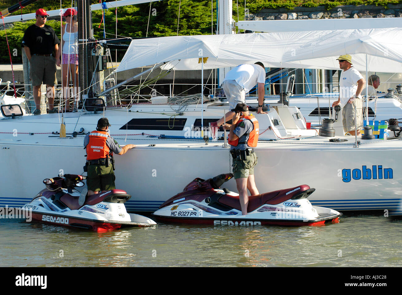 Police Patrol on Wave Runners Stock Photo - Alamy