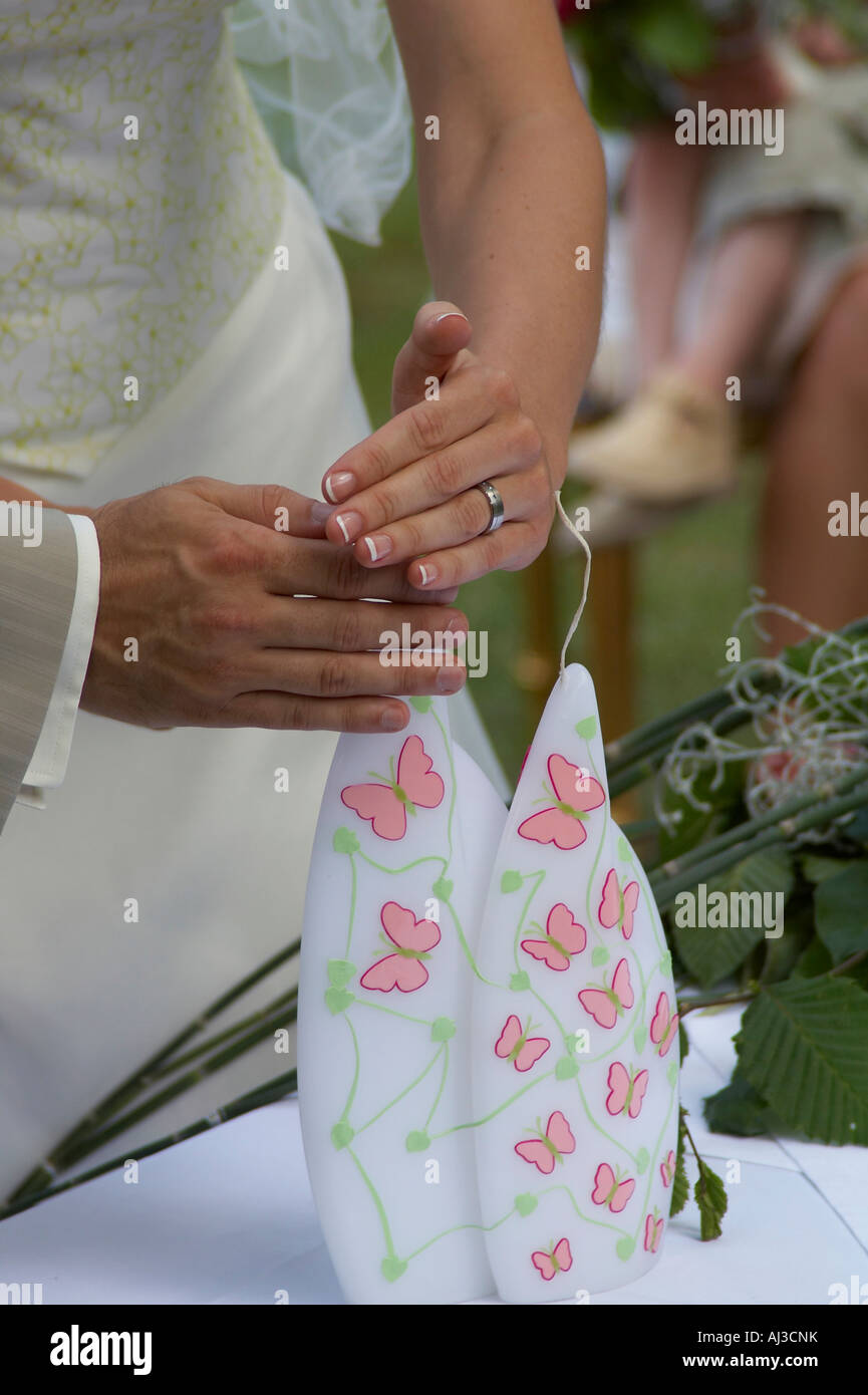 bridal couple lighting the wedding candle Stock Photo Alamy