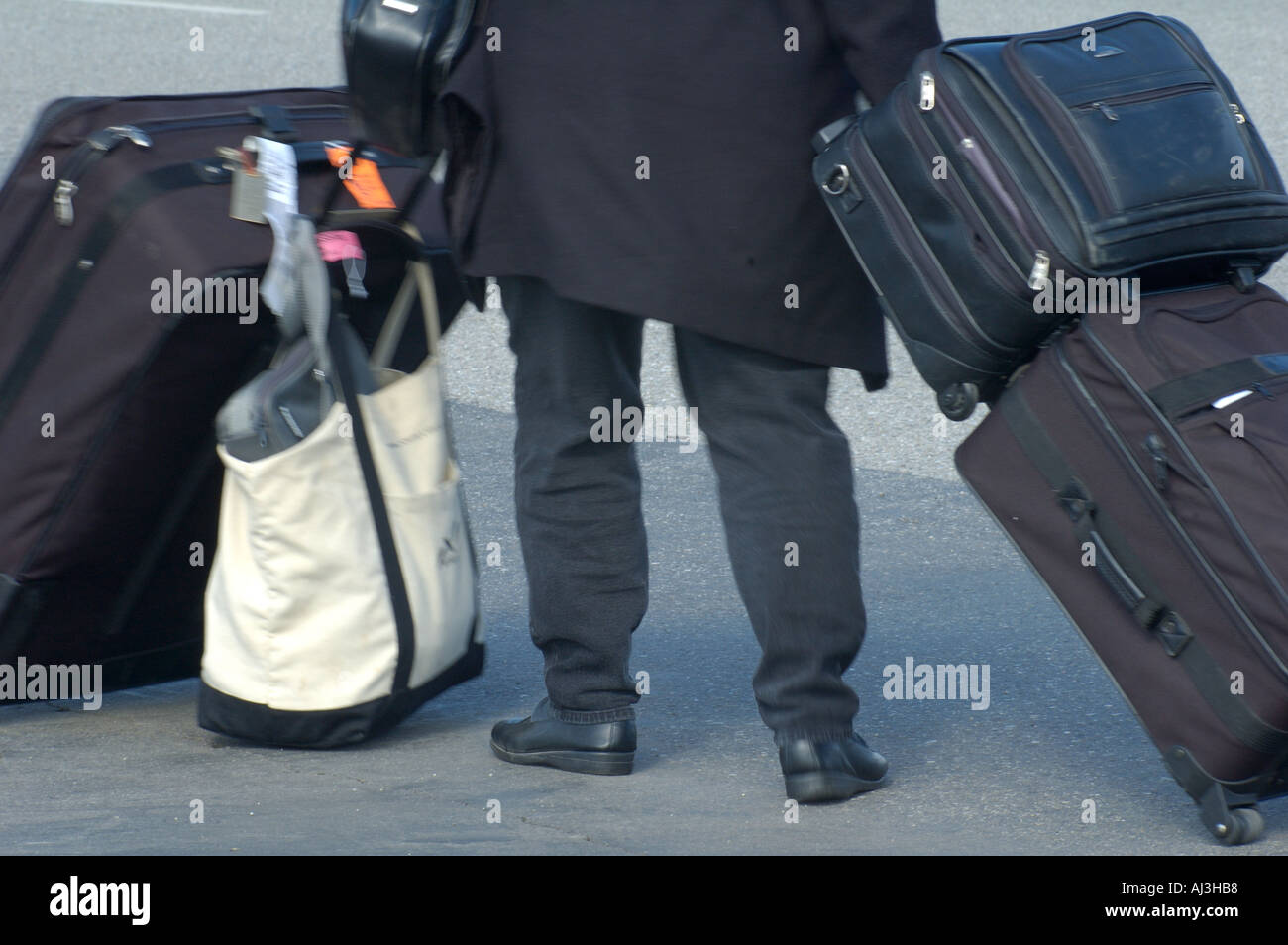 Woman Traveling With Heavy Luggage Stock Photo Alamy
