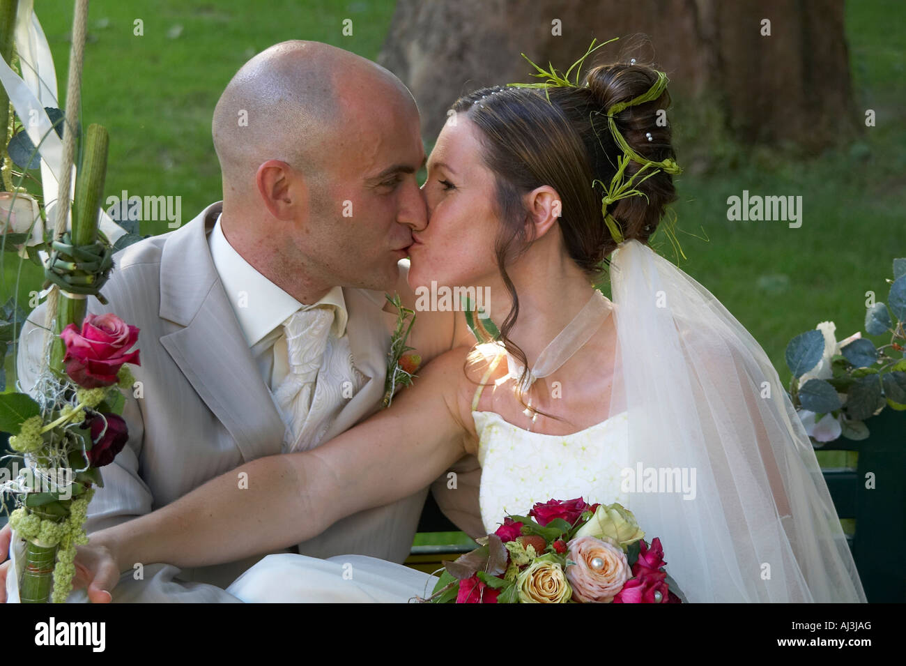 bridal couple kissing Stock Photo