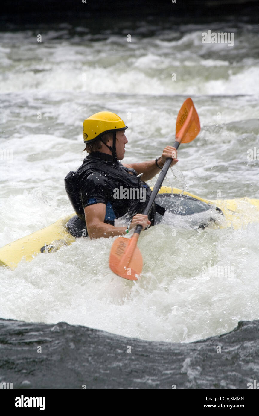 Kayaking through rough water Stock Photo