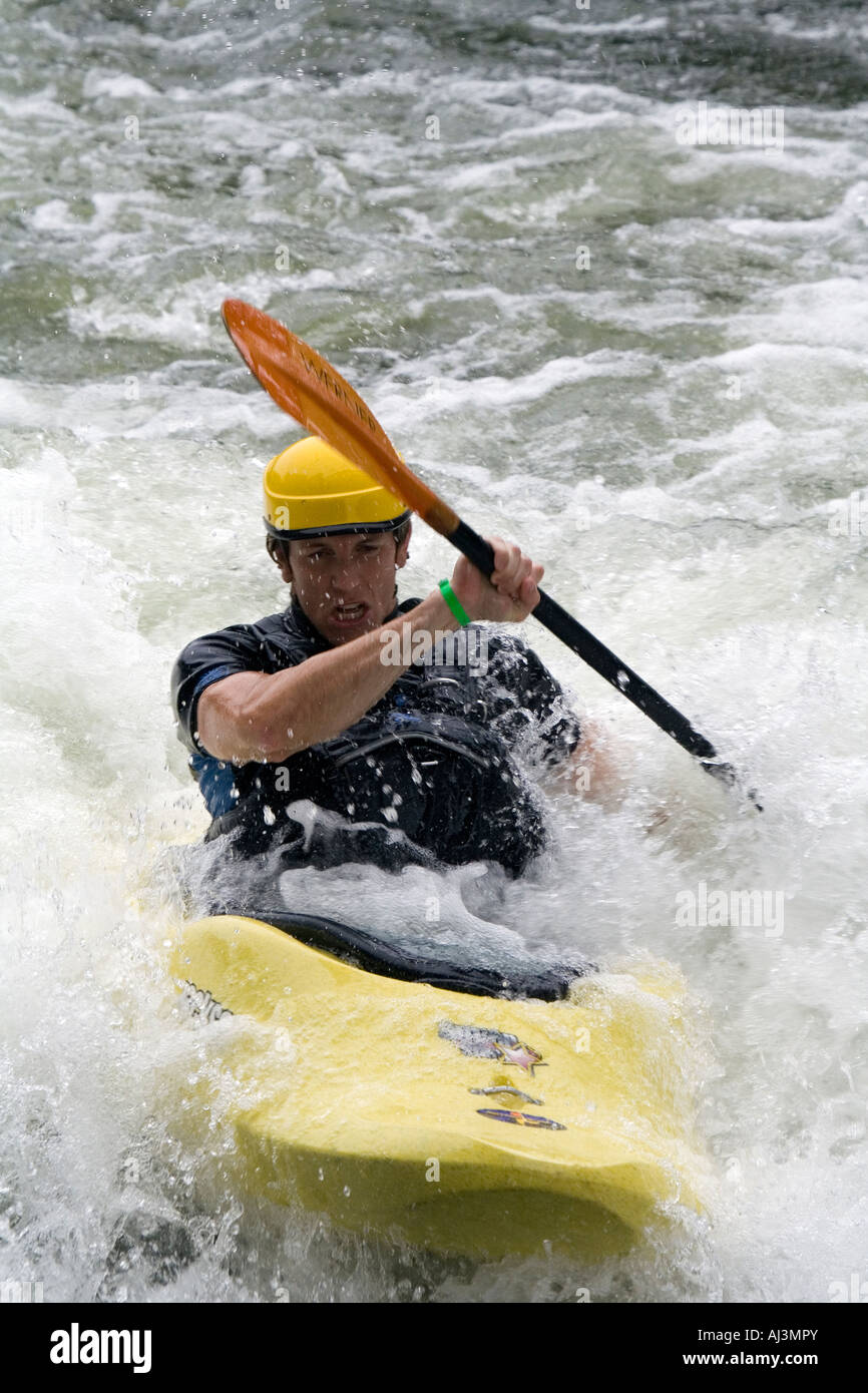 Paddling through whitewater rapid Stock Photo Alamy
