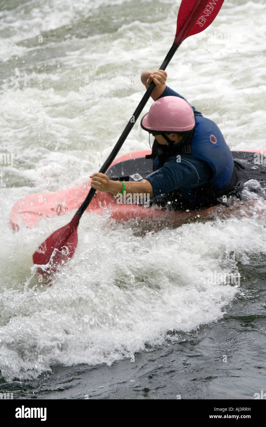 Paddling through whitewater current Stock Photo Alamy