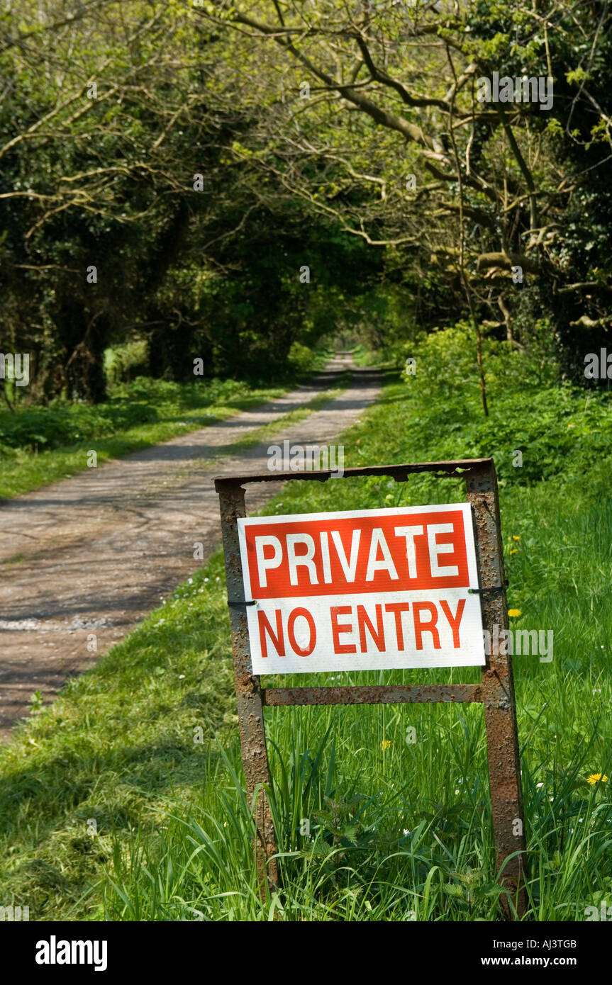 Private - no entry sign beside a wooded laneway Stock Photo - Alamy