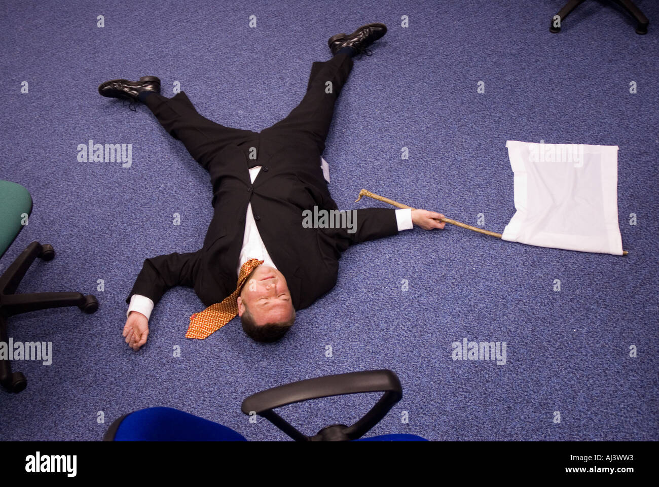 Man in office with white flag ,surrender,humor funny Stock Photo - Alamy Man in office with white flag ,surrender,humor funny Stock Photo - Alamy